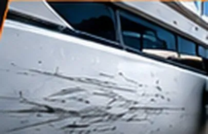 Scratches and dock rash on a boat hull